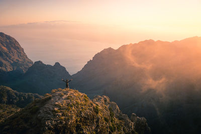 Scenic view of mountains against sky during sunset