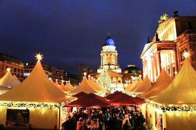 Panoramic view of crowd at night