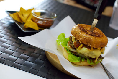 Close-up of burger in plate on table