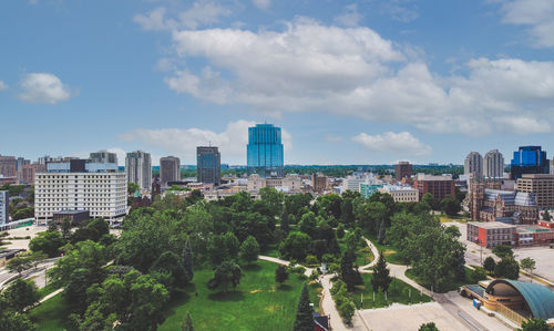 Buildings in city against sky