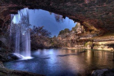 Scenic view of river flowing through rocks