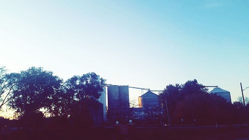 Buildings against clear sky