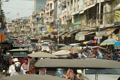 People at street market in city