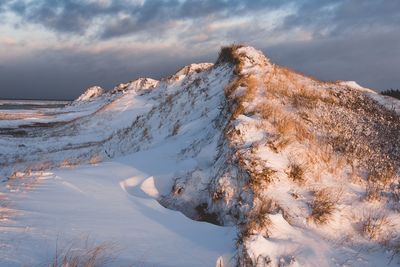 Scenic view of snowcapped mountain against sky