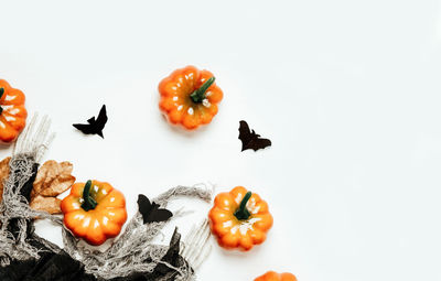 Close-up of bell peppers against white background