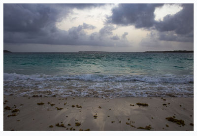 Scenic view of beach against sky