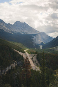 Scenic view of landscape and mountains against sky