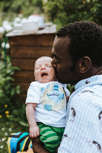 Father with newborn baby