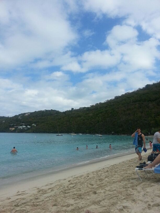 water, beach, leisure activity, lifestyles, sky, men, sand, vacations, sea, shore, cloud - sky, mountain, nature, scenics, tranquility, person, tranquil scene, nautical vessel, tourist