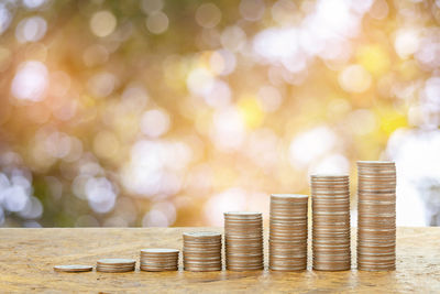 Close-up of coins on table