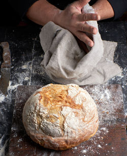 Midsection of man preparing food