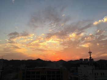 View of cityscape at sunset