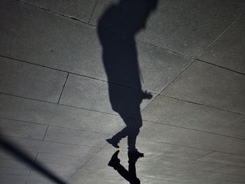 Shadow of woman on wall