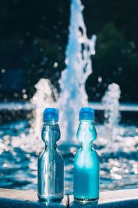 Close-up of water bottle in swimming pool