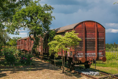 Train on railroad track against sky