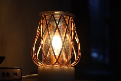 Close-up of illuminated light bulb