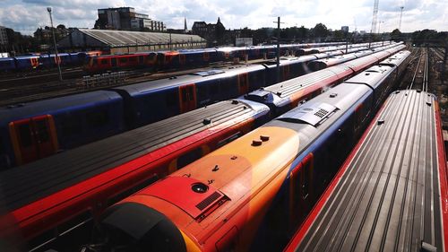 High angle view of train in city against sky