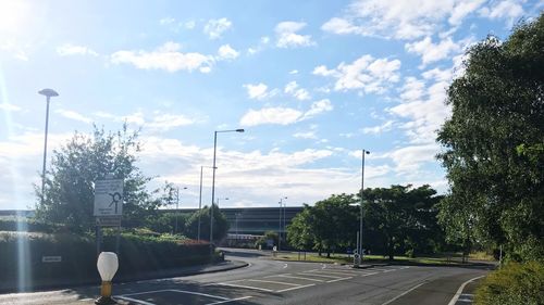 Road in city against sky