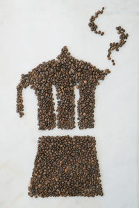 High angle view of coffee beans on table