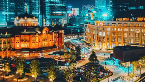 Illuminated buildings in city at night