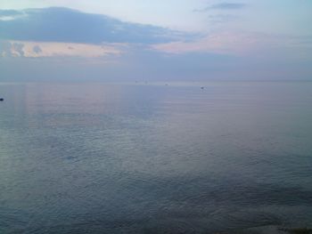 Scenic view of sea against sky at sunset