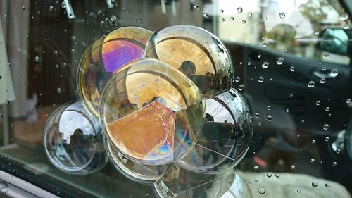 Close-up of bubbles stuck to glass