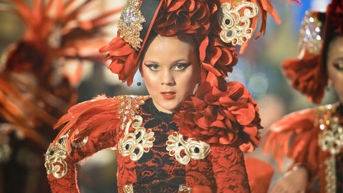 Close-up of young woman in traditional clothing