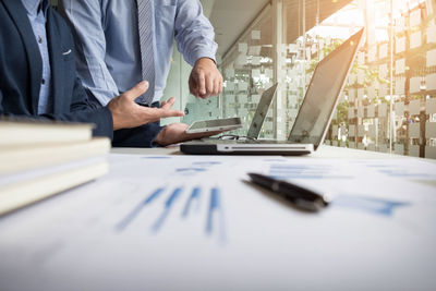 Close-up of man working on table