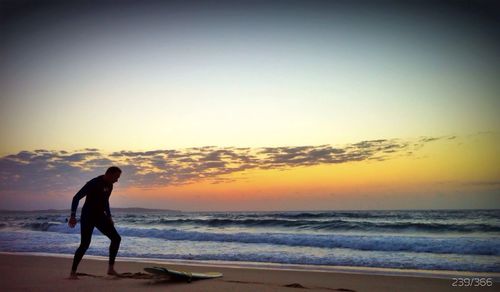 Scenic view of sea at sunset