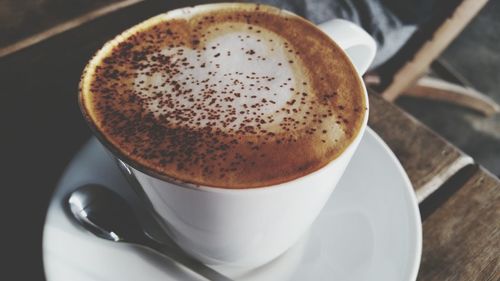 High angle view of cappuccino on table