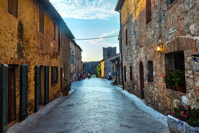 Narrow alley along buildings