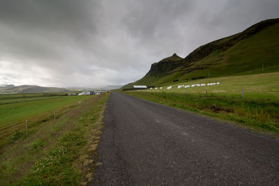 Road passing through field