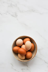 High angle view of eggs in bowl