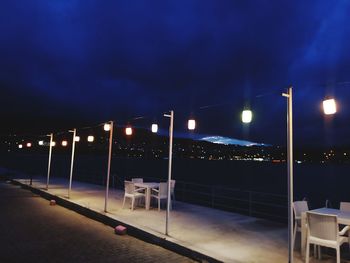 Illuminated street lights at night