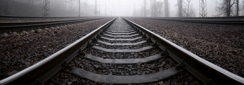 Surface level of railroad tracks in foggy weather