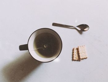 Directly above shot of coffee cup on table
