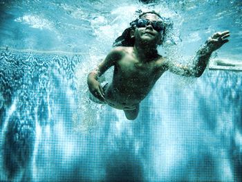 Man swimming in sea