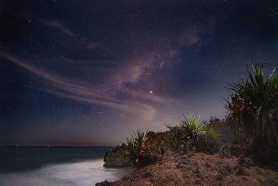 Scenic view of sea against sky at night