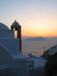 Scenic view of sea against clear sky during sunset