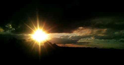 Scenic view of silhouette landscape against sky during sunset