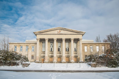 Building against sky during winter