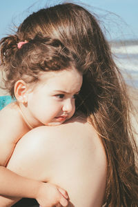 Close-up of girl and mother