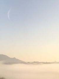 Scenic view of mountains against sky during sunset