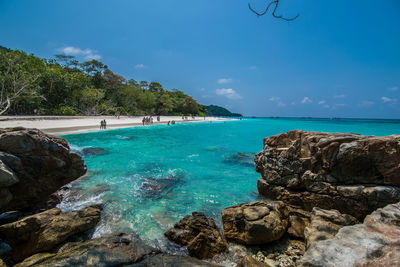 Scenic view of sea against blue sky