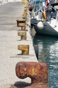 Boats moored at pier