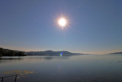 Scenic view of lake against clear sky