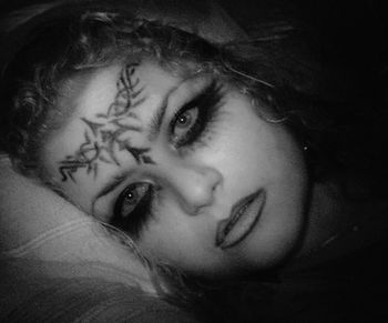 Close-up portrait of young woman