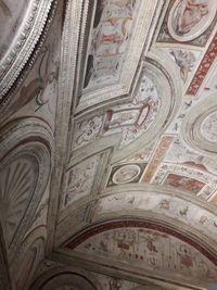 Low angle view of ornate ceiling in historic building