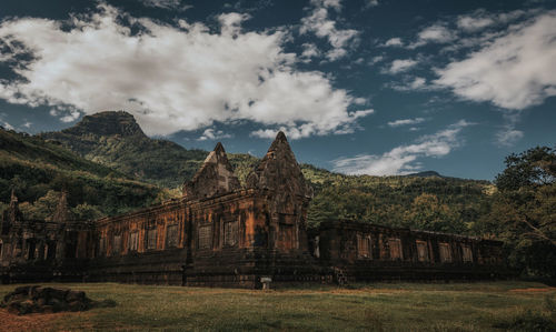 Old building against cloudy sky