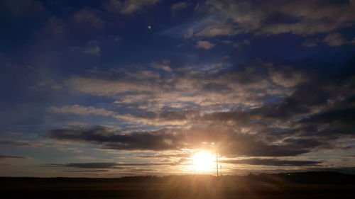 Scenic view of silhouette landscape against sky during sunset